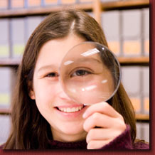 a child with a looking glass