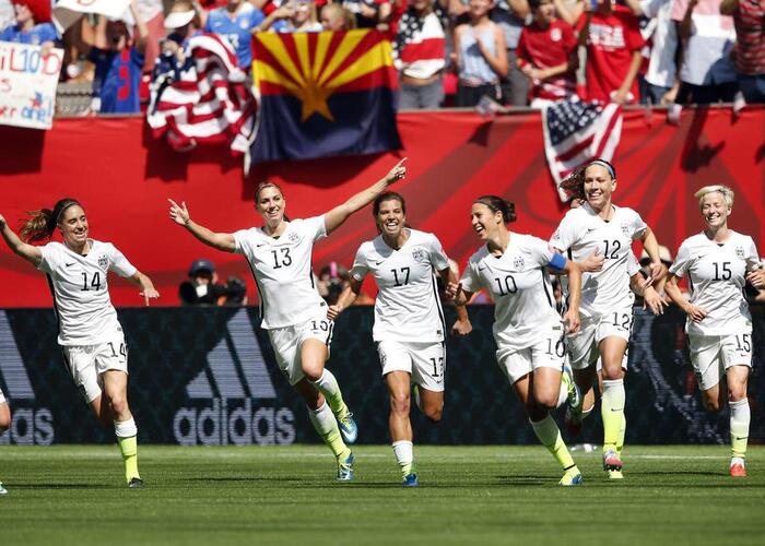 Women soccer team celebrate