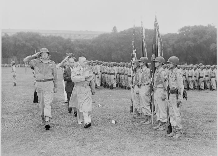 Photograph of President Truman reviewing the Japanese-American 442nd