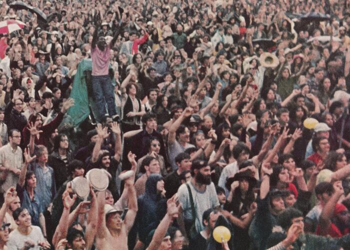 Color image of group of people at outdoor concert