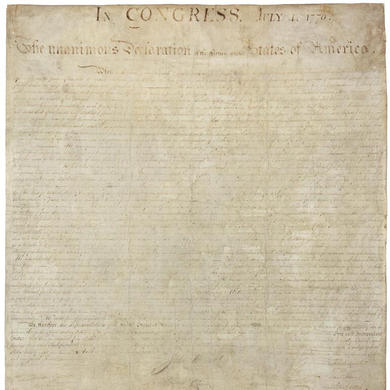 Cream parchment page with black text and ink signatures