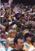 A crowd forms waving American flags following the attacks on September 11, 2001 in New York City.