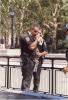 A New York police officer wipes their eyes following the attacks on September 11, 2001.