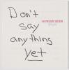 A note that says "Don't say anything yet," with "yet" underlined, handed to President George W. Bush when he learned of the attacks on September 11, 2001