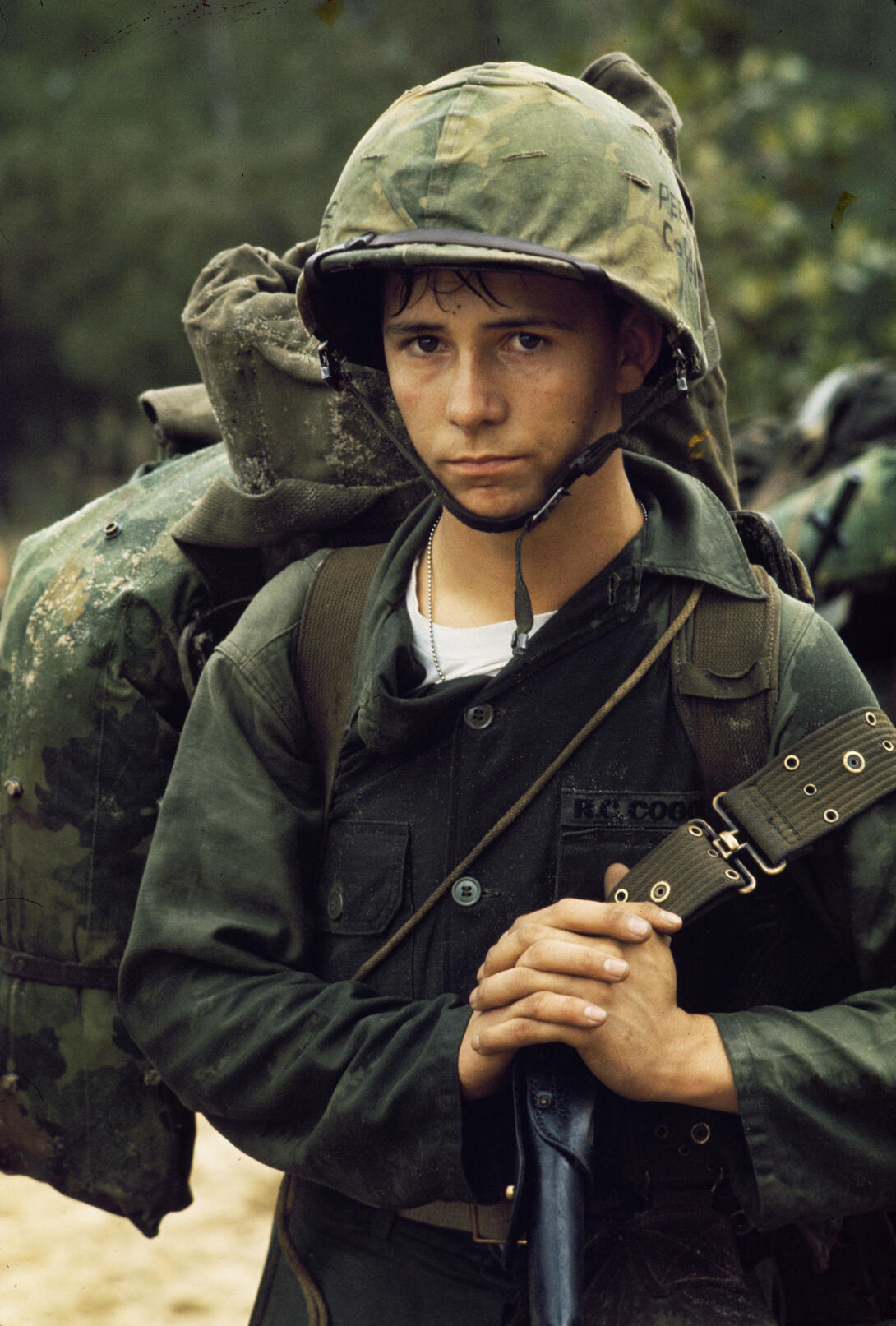 Young Marine waits on the beach during the Marine landing