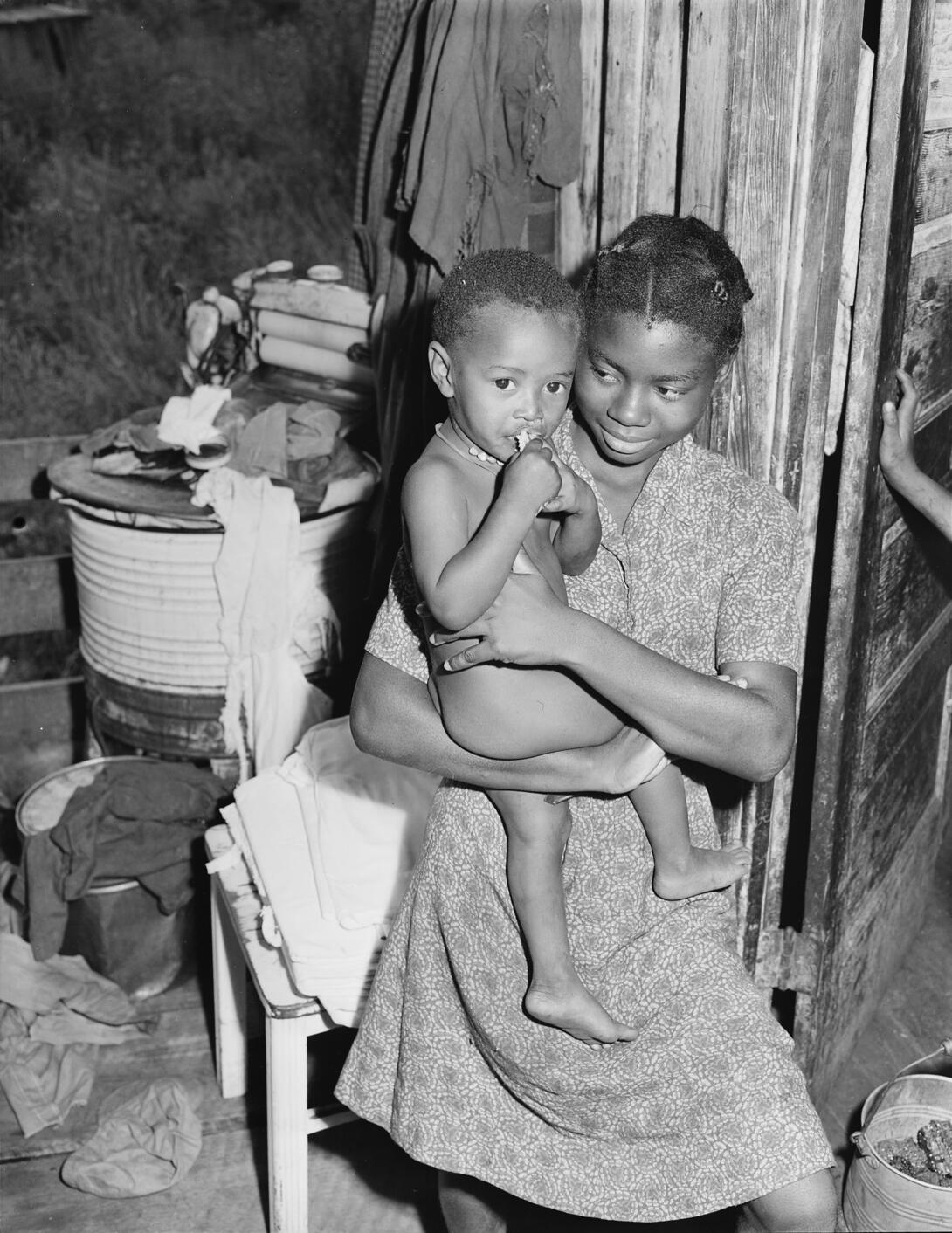 Two black children in home