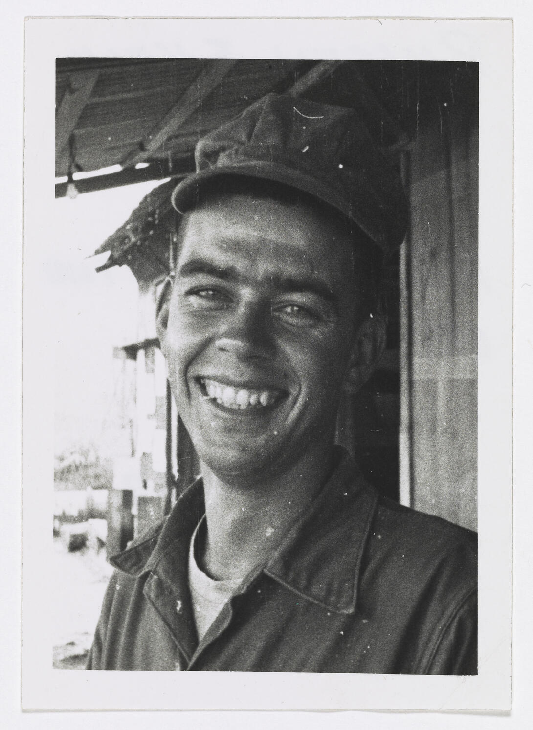 Black and white photograph of smiling soldier