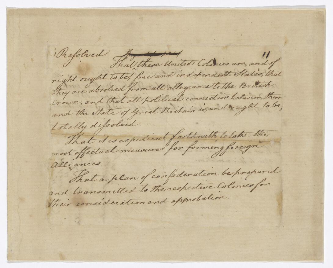 Tan half-page document with black handwritten text