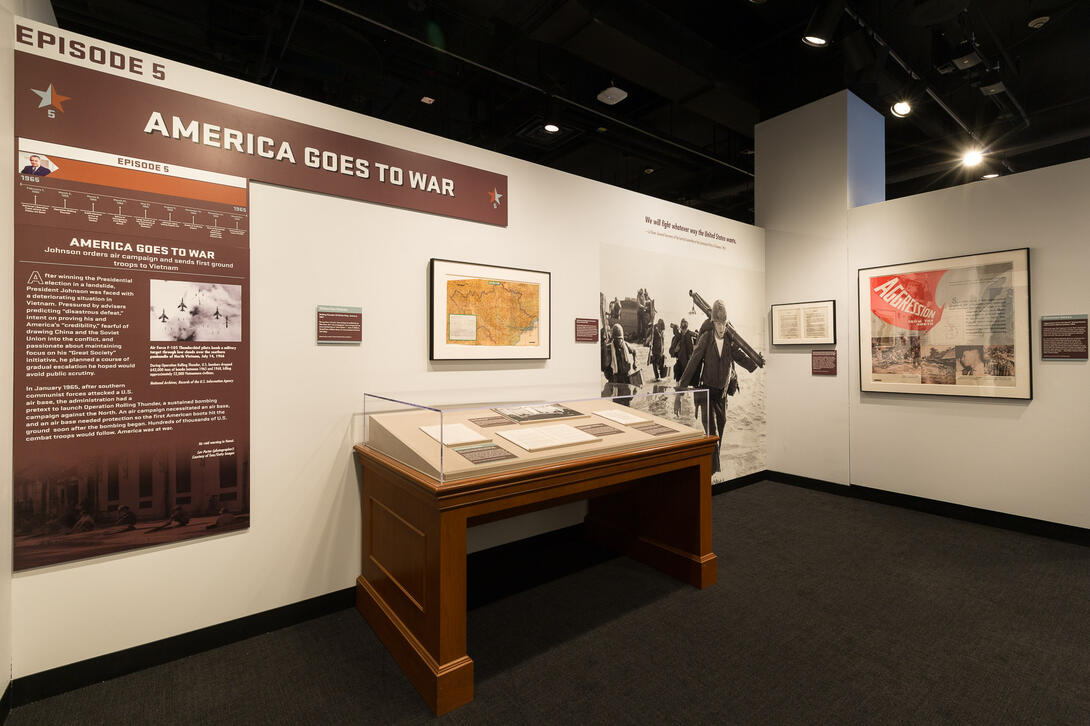 Color photograph of exhibit gallery with case in center