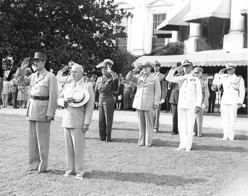 Black and white photograph of military men standing at attention.